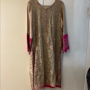 Pakistani skin/golden multi color embroidery suit